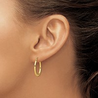 10K Yellow Gold Textured Hollow Oval Hoop Earrings view 3