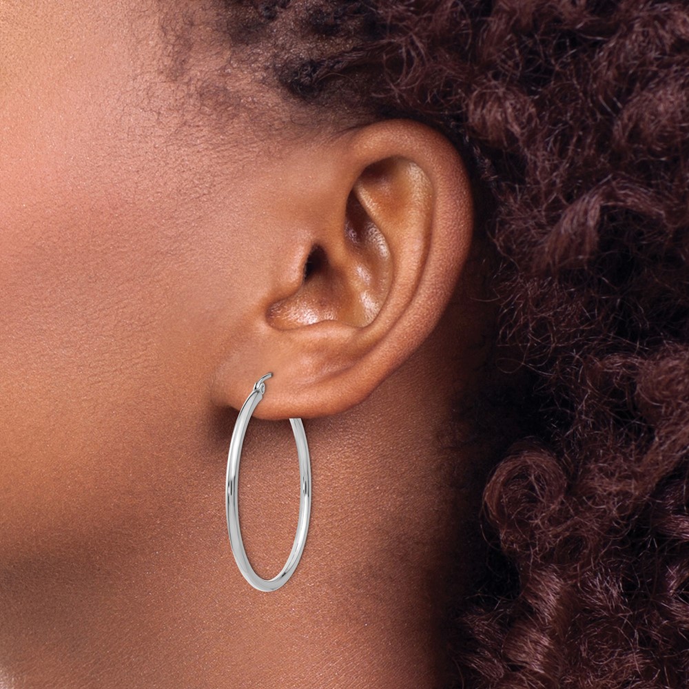 10K White Gold Polished 2mm Tube Hoop Earrings (10T825)