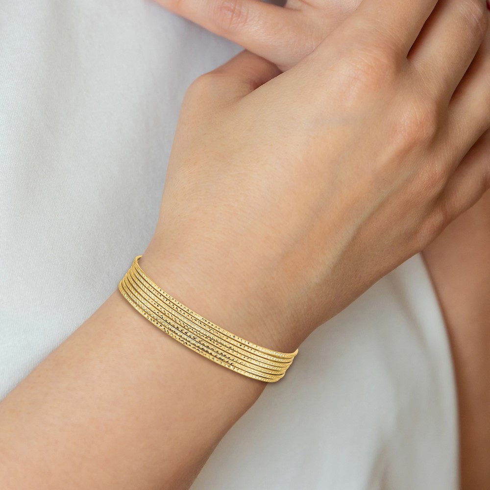 14K Polished and Textured with Dangle Heart 7-Strand 11.00mm Slip-on Round Bangle Bracelet (DB534)