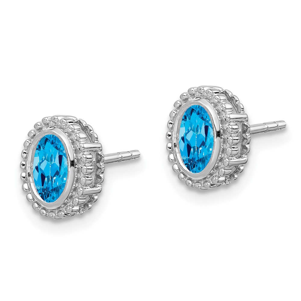 10k White Gold Oval Blue Topaz Post Earrings (EM7202-BT-1W)