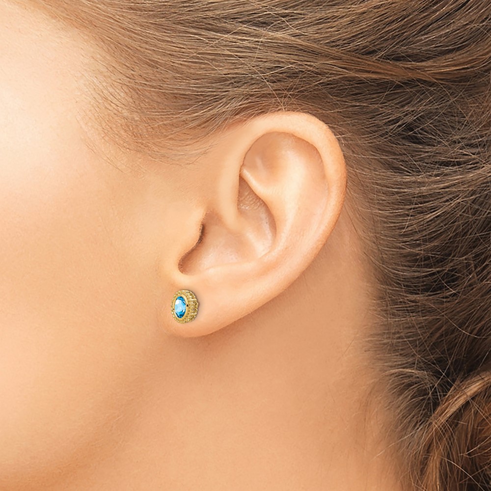 14k Oval Blue Topaz Post Earrings (EM7202-BT-Y)