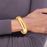 14K Yellow Gold 0.69 High Polished 17.00mm Hinged Oval Bangle Bracelet view 4