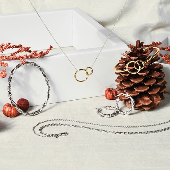 Leslie's Gold Circles Hinged Bangles