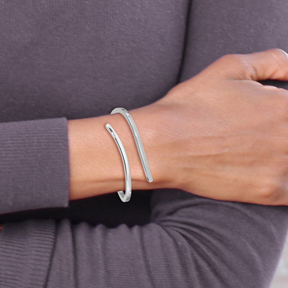Sterling Silver Rhodium-plated Polished Bypass Hinged Bangle (QB1313)