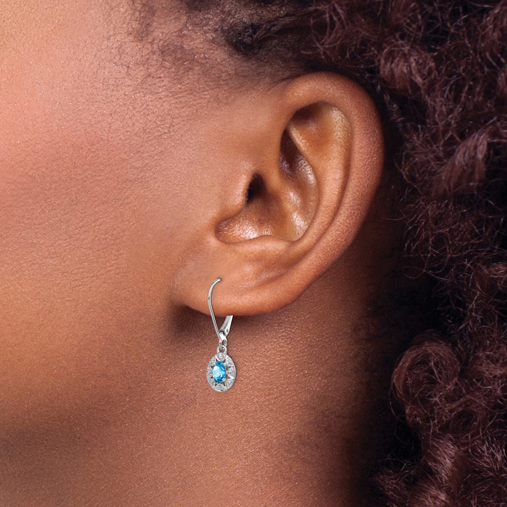 Sterling Silver Rhodium-plated Diam. & Blue Topaz Earrings (QBE10DEC)