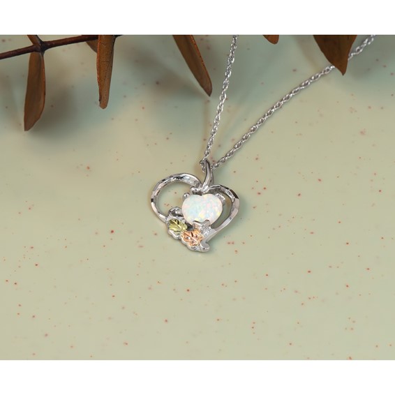 Landstrom's Mt. Rushmore Black Hills Sterling Silver 12K Gold Accents Lab Created White Opal Heart 18 inch Spring Ring Clasp Necklace