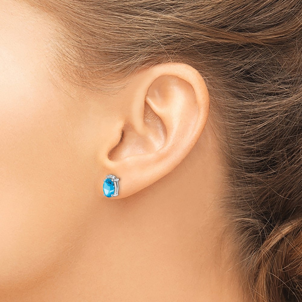Sterling Silver Rhodium Plated Oval Blue Topaz and Diamond Post Earrings (QDX507)