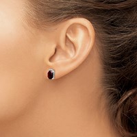 Sterling Silver Rhodium Plated Oval Garnet and Diamond Post Earrings view 3