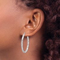 Sterling Silver RH-plated D C Textured 3mm Oval Hoop Earrings view 3