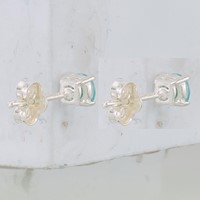 Sterling Silver Polished 4mm Round Light Blue CZ Stud Earrings view 4