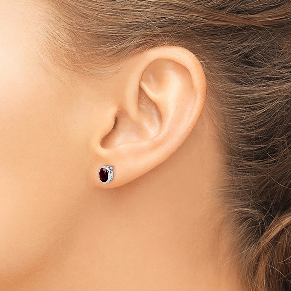 Sterling Silver Rhodium-plated Polished Garnet Oval Post Earrings (QE12626GA)