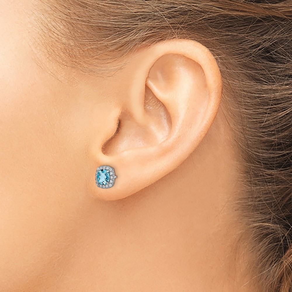 Sterling Silver Rhodium plated Blue Topaz and Cr. Wht Sapphire Earrings (QE13996)