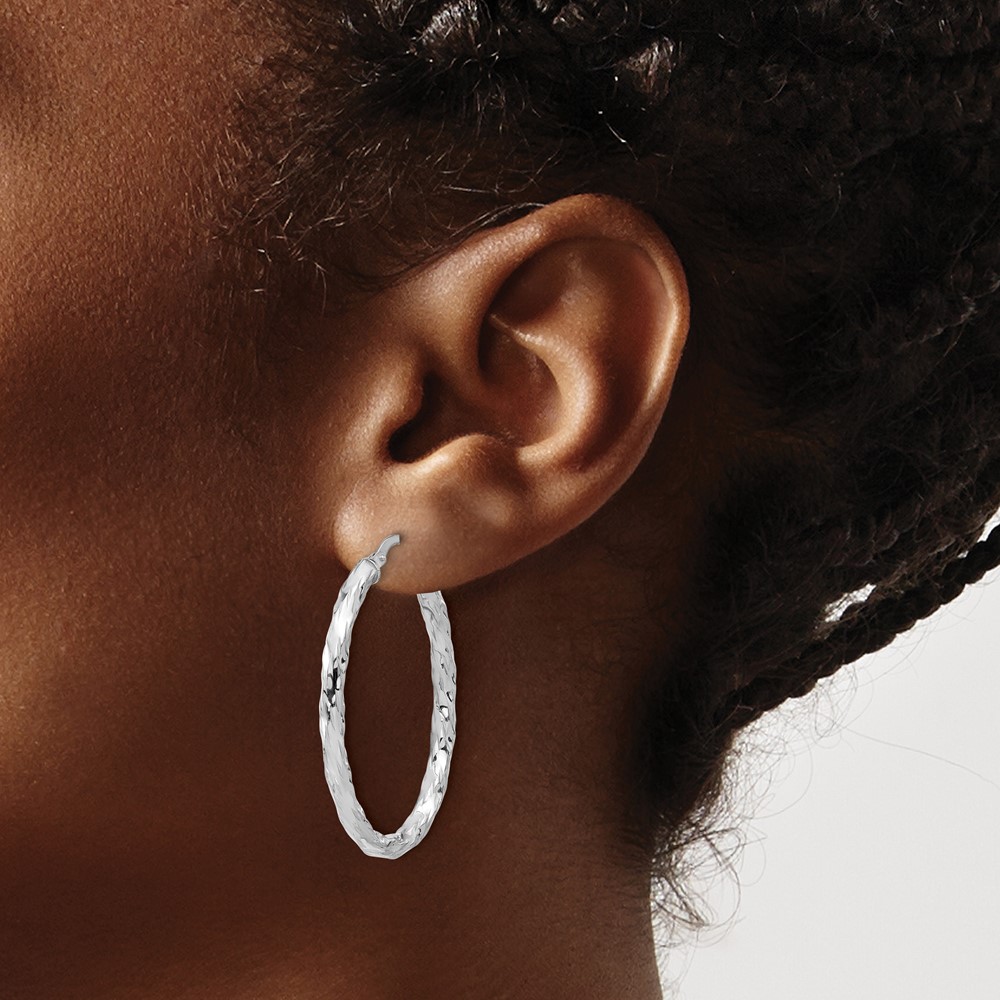 Sterling Silver Rh-plated Polished and Textured Twisted Oval Hoop Earrings (QE16833)