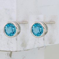 Sterling Silver Rhodium-plated Blue Topaz Circle Stud Earrings view 2