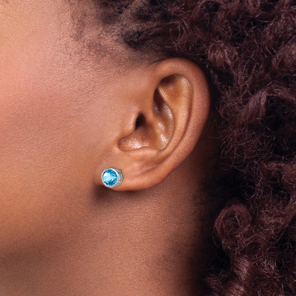 Sterling Silver Rhodium-plated Blue Topaz Circle Stud Earrings (QE9411BT)