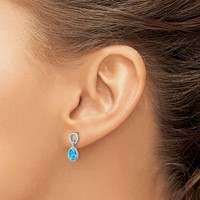 Sterling Silver Rhodium Plated Blue Topaz Pear Twisted Post Earrings view 3