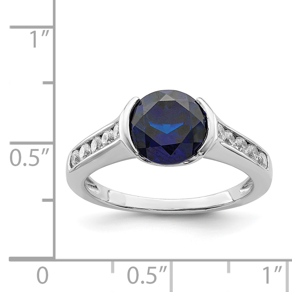 Sterling Silver Rhodium-plated Synthetic Blue Sapphire and CZ Bezel Ring (QR6349-8)