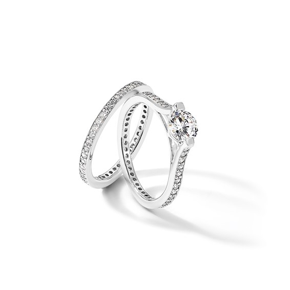 Sterling Silver Rhodium-plated CZ Eternity Engagement Ring and Band Set