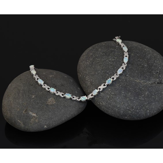 Sterling Silver Rhodium Plated 7.5inch Created Opal XO Bracelet