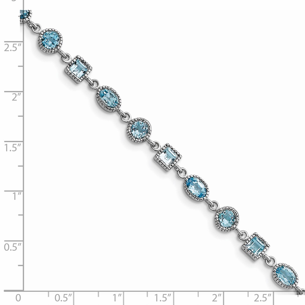 Sterling Silver Rhodium-plated Blue Topaz Bracelet (QX602BT)