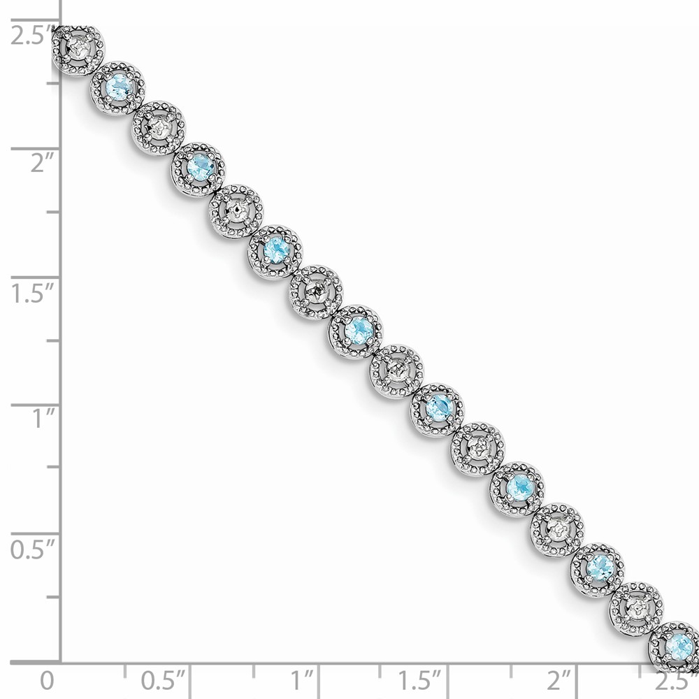 Sterling Silver Rhodium-plated Blue Topaz Diamond Bracelet (QX829BT)