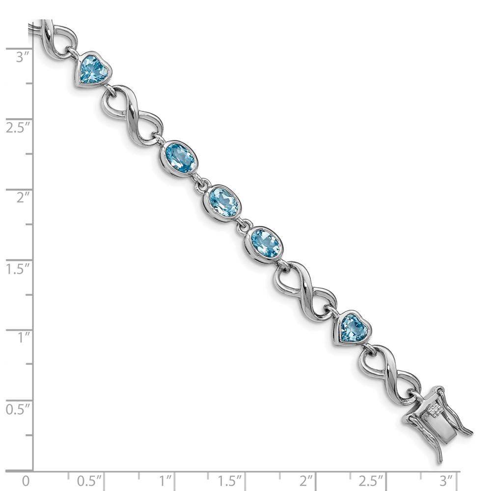 Sterling Silver Rhodium-plated Oval Heart Blue Topaz Bracelet (QX875BT)