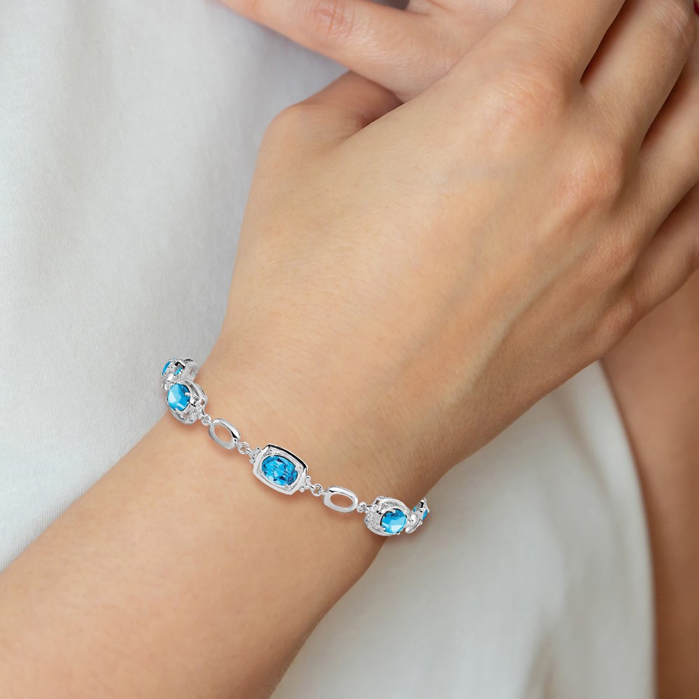 Sterling Silver Rhodium-plated Light Swiss Blue Topaz Link Bracelet (QX948BT)