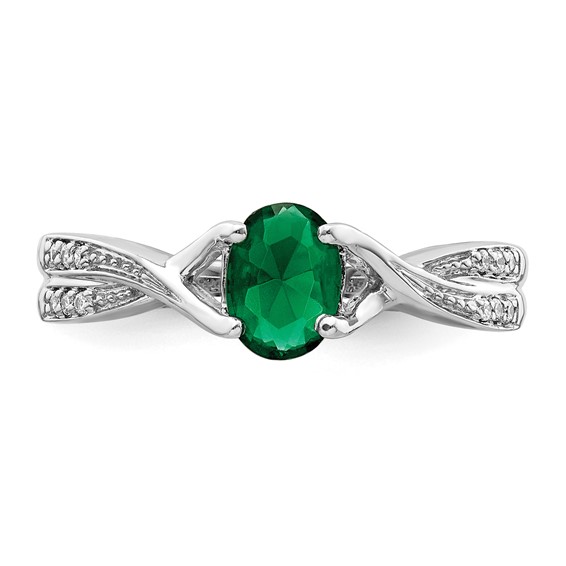 14k White Gold 7x5mm Oval Emerald and 1/15 carat Diamond Ring