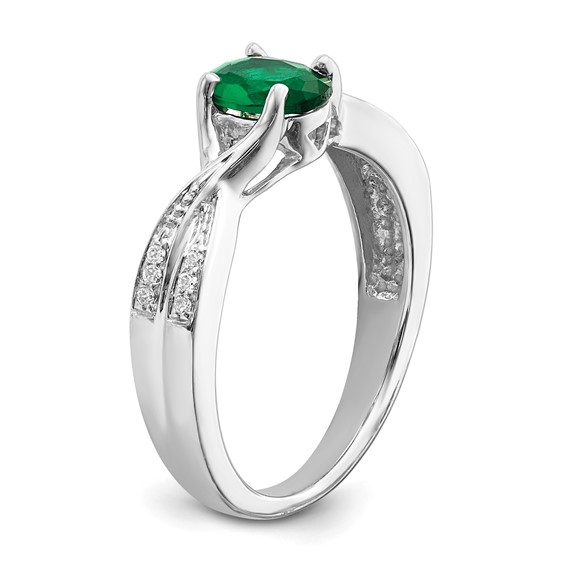 14k White Gold 7x5mm Oval Emerald and 1/15 carat Diamond Ring