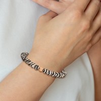 Chisel Stainless Steel Polished Rose IP-plated 6mm Black and White Striped Agate Beaded Stretch Bracelet view 4