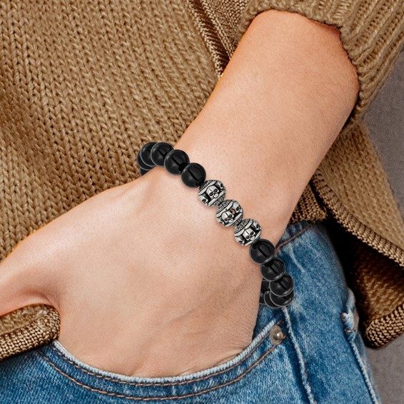 Chisel Stainless Steel Antiqued and Polished Skull Beads and Black Onyx 7.5 inch Stretch Bracelet