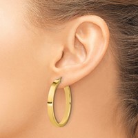 14K Yellow Gold 4x35mm Polished Tube Hoop Earrings view 3