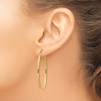 14K Yellow Gold 2x47mm Oval Polished Tube Hoop Earrings view 3