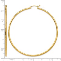 14K Yellow Gold 2x 65mm Diamond-cut Round Tube Hoop Earrings view 4