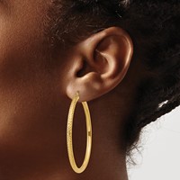 14K Yellow Gold 3x 50mm Diamond-cut Round Tube Hoop Earrings view 3