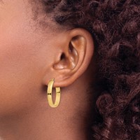 14K 4x25mm Lightweight Oval Tube Hoop Earrings view 3