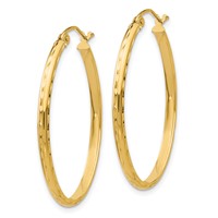 14K Yellow Gold 2.5x 35mm Lightweight Diamond-cut Oval Tube Hoop Earrings view 2