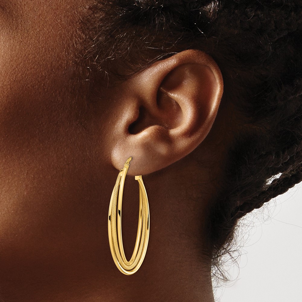 14k Polished and Textured Twisted Fancy Oval Hoop Earrings (TF1351)