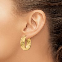 14K Yellow Gold Diamond Cut Oval Hoop Earrings view 3