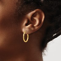 14K Yellow Gold Twist Hollow Hoop Earrings view 3