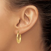14K Yellow Gold Diamond Cut Hollow Hoop Earrings view 3
