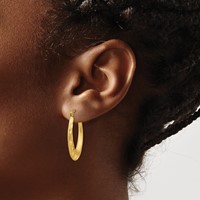 14K Yellow Gold Satin Diamond Cut Hollow Hoop Earrings view 3