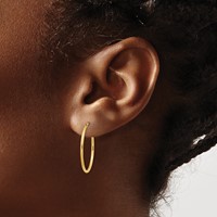 14K Yellow Gold 1.2x25mm Polished Endless Tube Hoop Earrings view 3