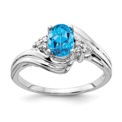 14K White Gold 7x 5mm Oval Blue Topaz and 0.07 Carat VS Diamond Ring