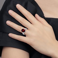 14K White Gold 12x 10mm Oval Garnet and 0.05 Carat AA Diamond Ring view 3