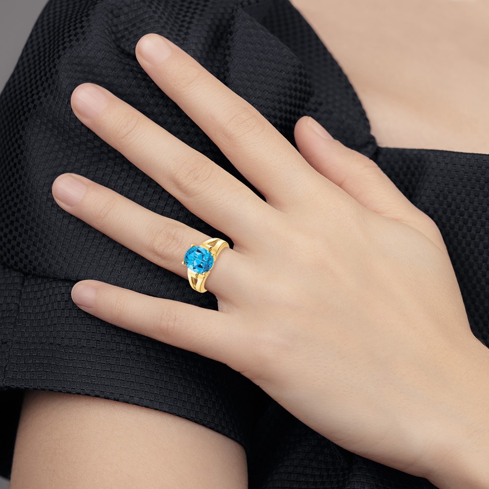 14k 11x9mm Oval Blue Topaz ring (Y4546BT)